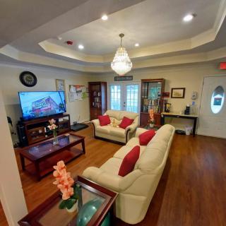 A cozy and well-decorated living room with a modern touch.