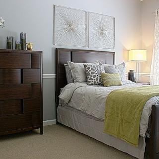 A cozy bedroom with modern decor and a comfortable bed.