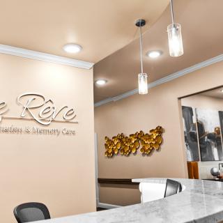 A modern reception area with stylish decor and lighting.