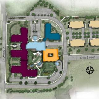 A color-coded map illustrating the layout of a building complex and surrounding landscape.