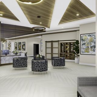 A modern lobby with stylish furniture and contemporary lighting.