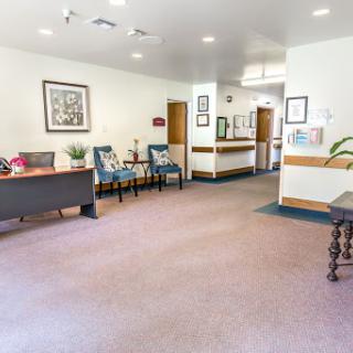 A spacious and welcoming waiting area featuring comfortable seating and a clean, modern design.