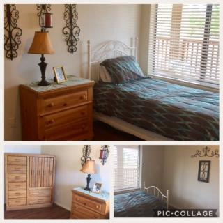 A cozy bedroom featuring a single bed, wooden dresser, and warm decor accents.
