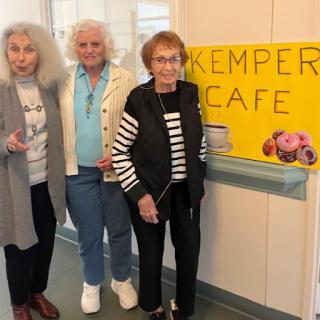 Three friends enjoying their time at Kemper Cafe.