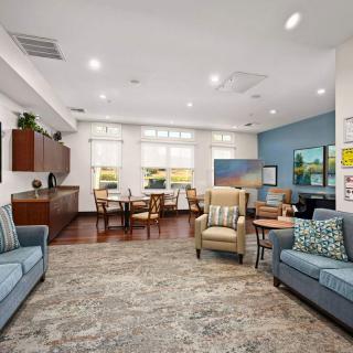 A modern living room with comfortable seating and natural lighting.
