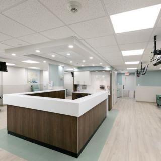 Modern hospital reception area with a clean and well-lit interior.