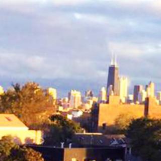 A vibrant city skyline at sunset, showcasing urban architecture.