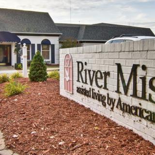 Entrance sign for River Mist Assisted Living facility.