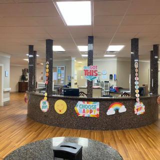 A welcoming reception area with colorful decorations and an open layout.