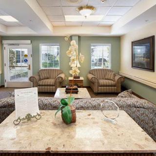 A cozy lobby area with comfortable seating and decorative elements.