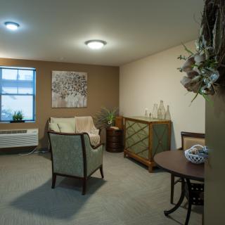 Cozy living room with comfortable seating and elegant decor.