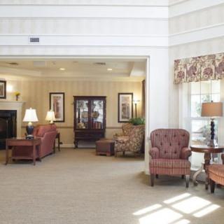 A spacious lobby area featuring traditional furniture and elegant decor.