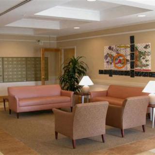 A modern lobby area with comfortable seating and contemporary decor.