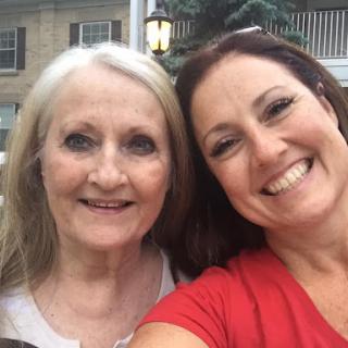 A joyful moment captured in a selfie between two friends enjoying their time together.