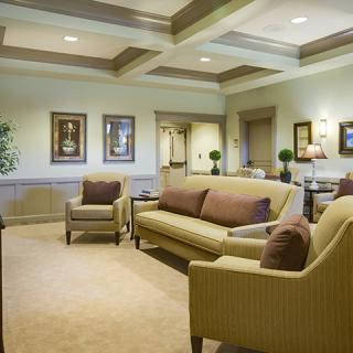 A cozy and elegantly designed living room with comfortable seating and tasteful decor.