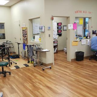 A view of a rehabilitation center featuring treatment areas and equipment.