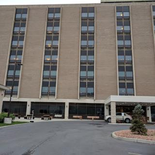 A multi-story hotel showcasing a modern architectural design.