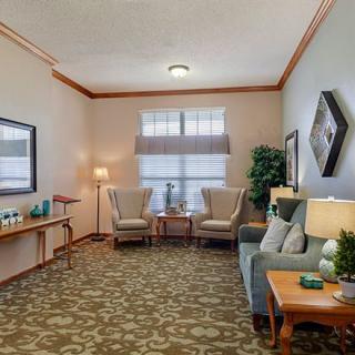 A cozy living room with comfortable seating and stylish decor.