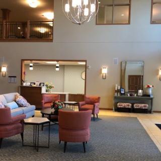 A modern lobby with comfortable seating and stylish lighting.
