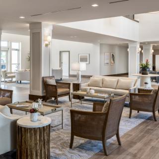 A modern and spacious lobby with comfortable seating and stylish decor.