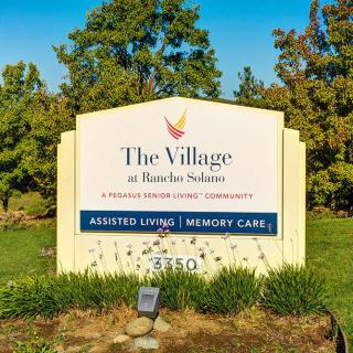 The Village at Rancho Solano sign for assisted living and memory care facility.