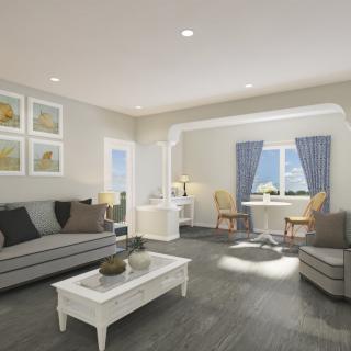 A stylish living room with cozy sofas, a white coffee table, and elegant decor.