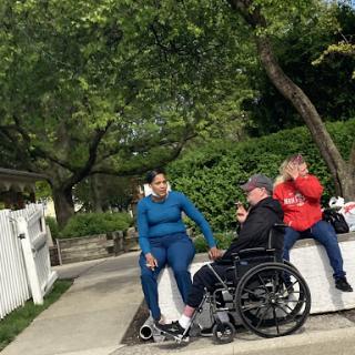 A group of friends enjoying a day out together in the park.