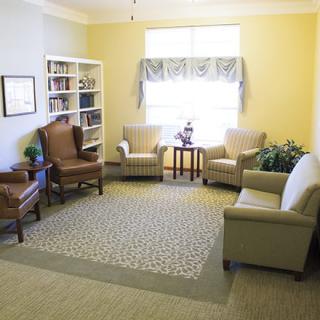 A cozy living room with comfortable seating and natural light.