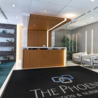 A modern office reception area with sleek design elements and comfortable seating.
