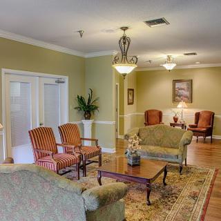 A well-furnished lobby area with seating and elegant decor.