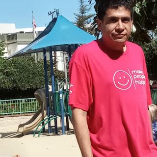 A person enjoying a sunny day at the playground.