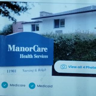 A sign for ManorCare Health Services, indicating it's a healthcare facility offering services like nursing and Medicare.