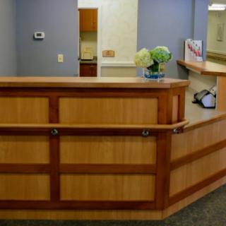 An office reception desk with a welcoming setup.