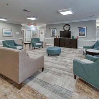 A modern living room with comfortable seating and tasteful decor.