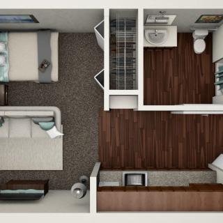 A top-down view of a one-bedroom apartment floor plan, featuring a living room, kitchen, and bathroom.