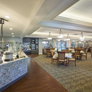 Interior view of a modern dining area with a buffet section.