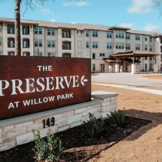 The Preserve at Willow Park entrance with its building in the background.