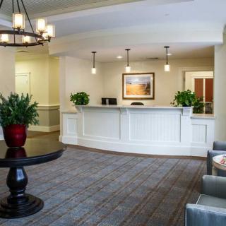 A welcoming lobby area with a reception desk and comfortable seating.