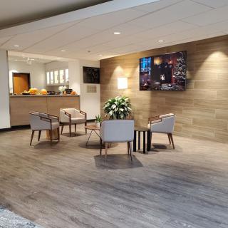 A modern lobby with stylish seating and a welcoming reception area.