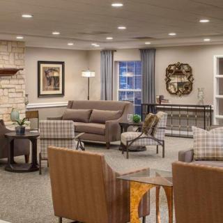 A cozy living room with comfortable seating and stylish decor.