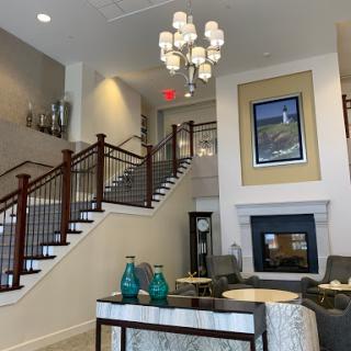 A stylish and inviting lobby featuring elegant lighting and modern furnishings.
