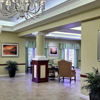 A spacious lobby interior with elegant furnishings and decor.