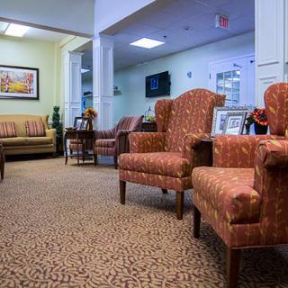 A cozy hotel lobby with comfortable seating and elegant decor.