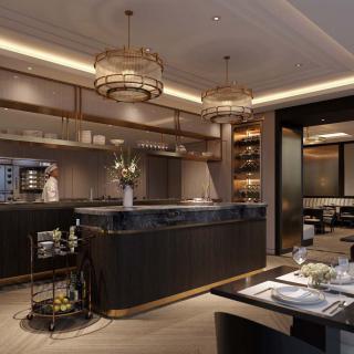 A luxurious modern kitchen with an island counter and elegant pendant lighting.