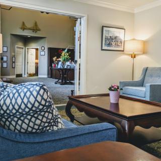 A cozy living room with comfortable seating and stylish decor.