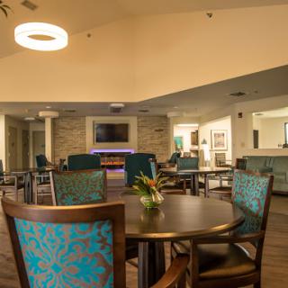 A cozy lounge area featuring stylish seating and modern decor.