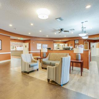 A cozy and welcoming lobby area featuring comfortable seating and a modern design.