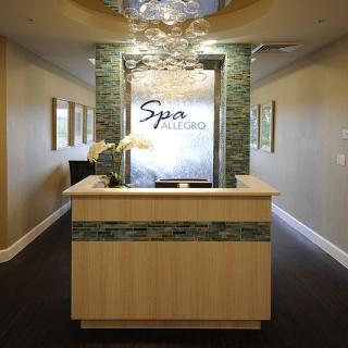 A tranquil spa reception area with a modern design and elegant decor.