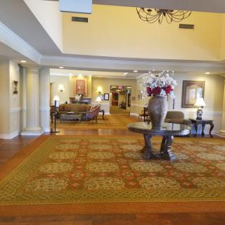 A welcoming hotel lobby featuring comfortable seating and elegant decor.