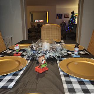 A beautifully set dining table ready for holiday celebrations.